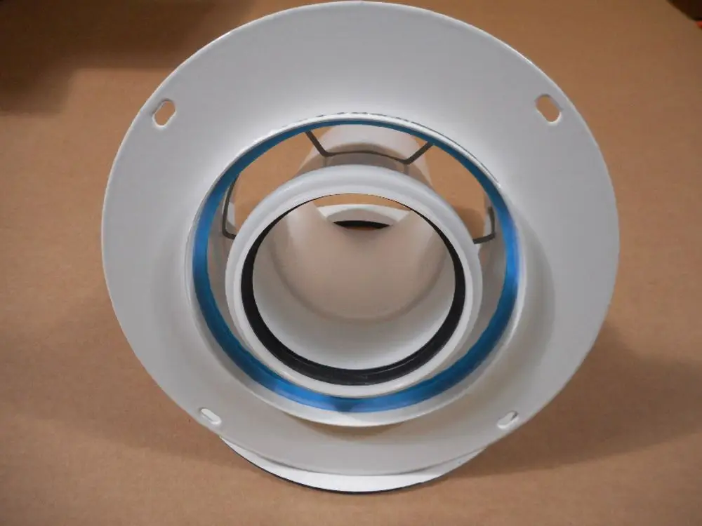 Adapter mit einem zentralen Loch und Gummidichtung, ausgeführt in weißem Kunststoff, geeignet für die Verbindung in Heizsystemen, hergestellt von Remeha.